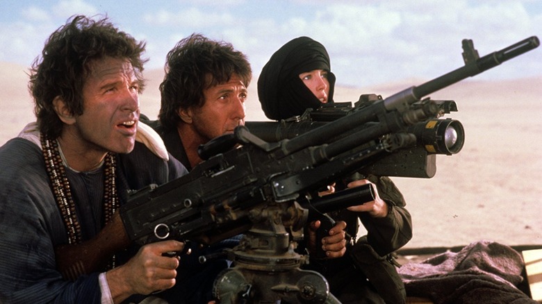 Chuck, Lyle, and Shirra aim their weapons in 'Ishtar' (1987)