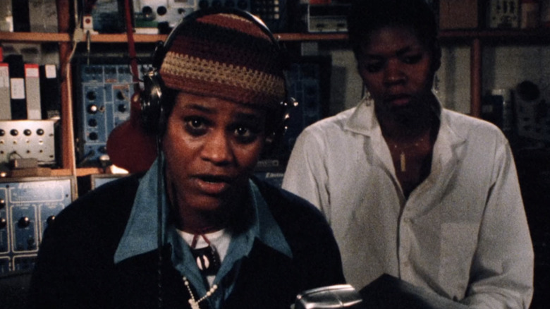 Honey speaking at the pirate radio station in Born in Flames (1983)