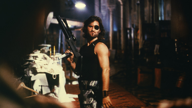 Snake Plissken wields a gun in 'Escape from New York' (1981)