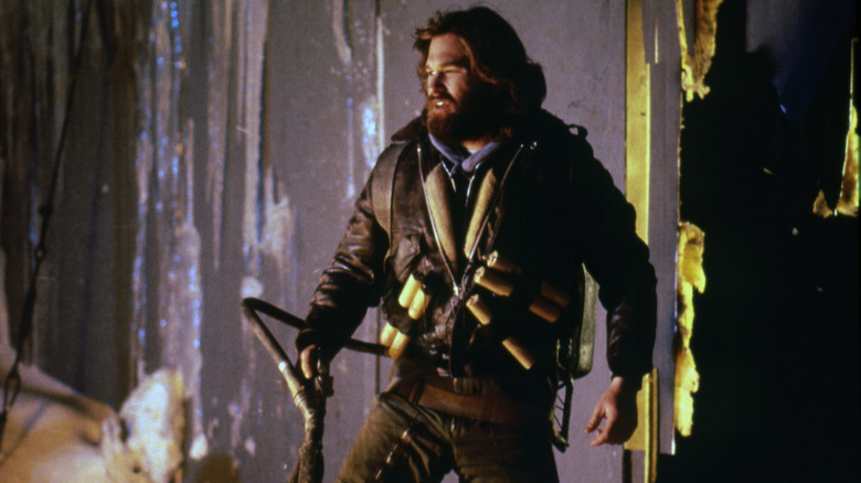 MacReady explores a spaceship wreckage in 'The Thing' (1982)