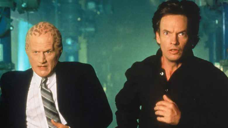 George and Matthew run toward danger in "Alien Nation"