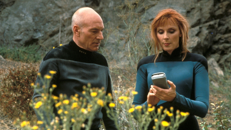 Crusher and Picard check out a tricorder in "Star Trek: The Next Generation"