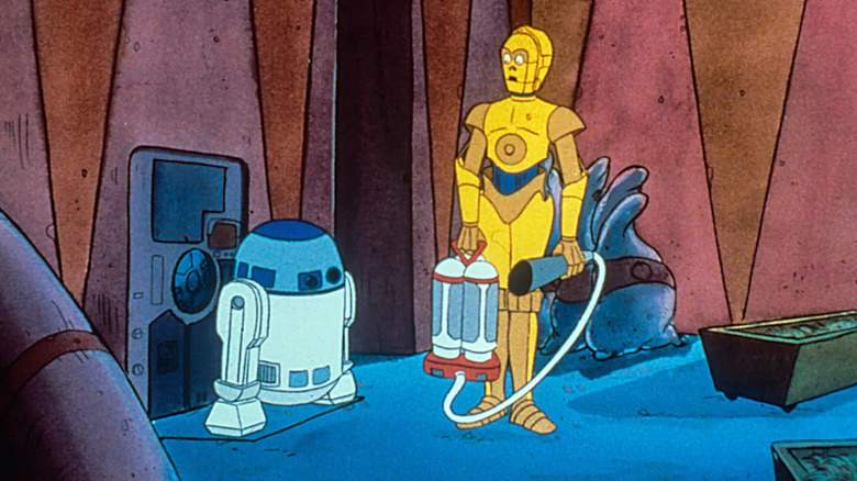 C-3P0 and R2D2 stand in a cave with a vacuum in "Star Wars: Droids"