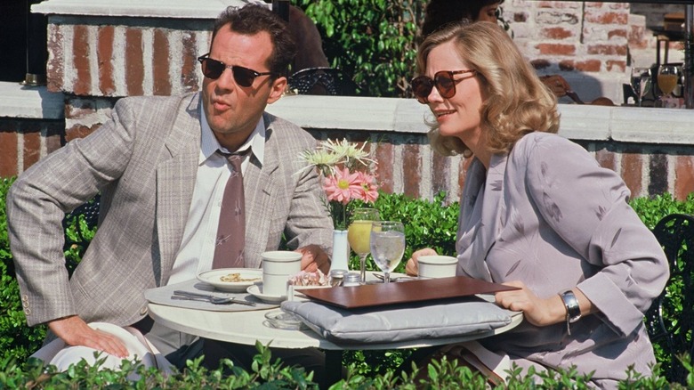 Maddie Hayes and David Addison scope out the action in "Moonlighting"