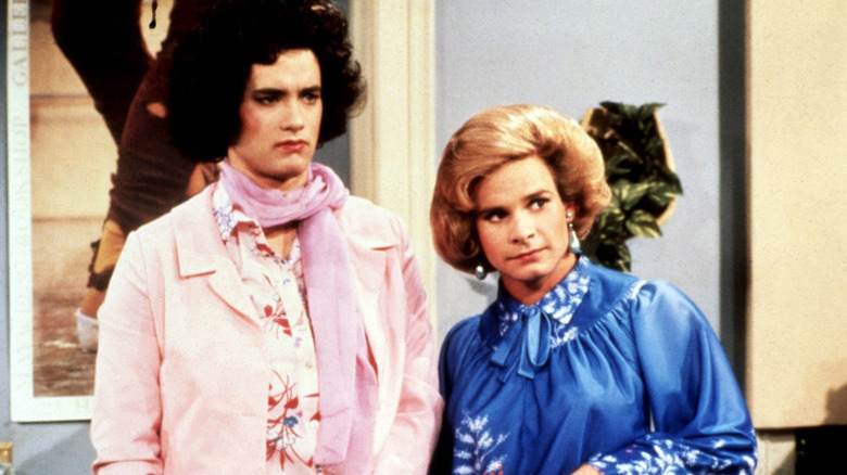 Buffy (Kip) Wilson stands next to Hildy (Henry) Desmond in their female disguises in Bosom Buddies.