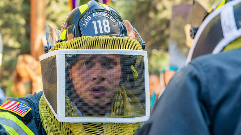 Buck wearing protective headgear