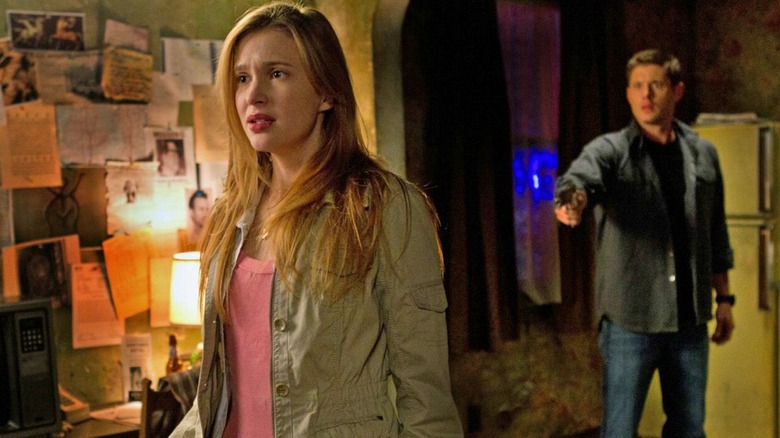 Dean points a gun at Emma