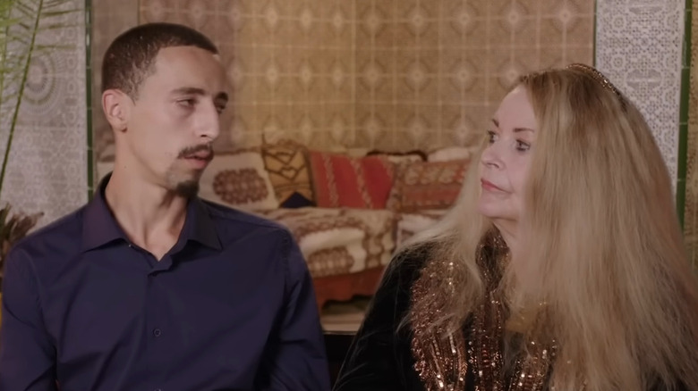 Oussama and Debbie talking