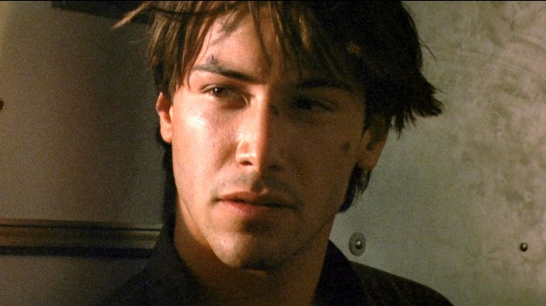 Johnny Utah sitting in Point Break