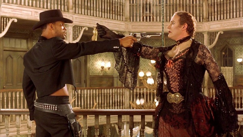 Capt. James West and U.S. Marshal Artemus Gordon drawing weapons at each other in Wild Wild West (1999)