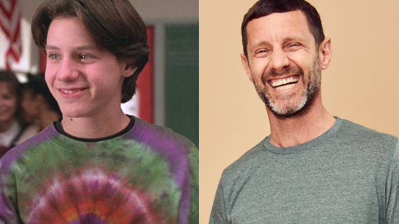 Max smiling in "Hocus Pocus" and Omri Katz smiling at 90s Con in Connecticut in 2023.