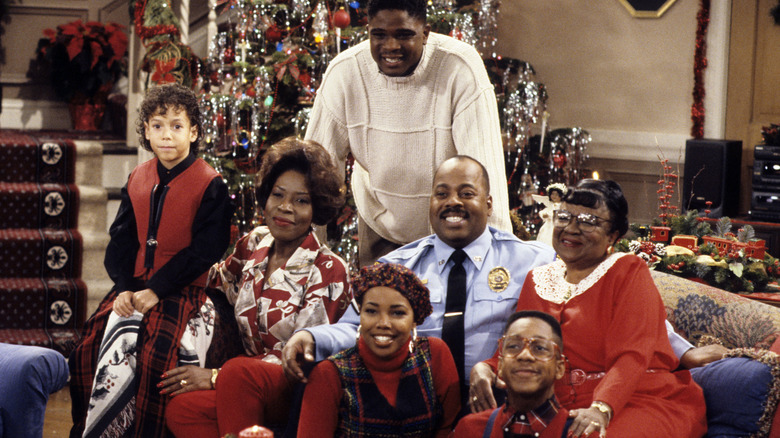 Urkel posing with the Winslows during Christmas (1994)