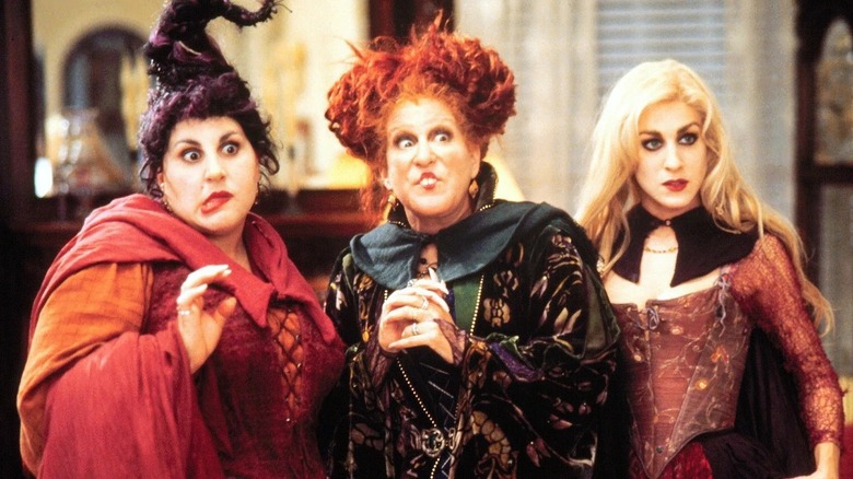 Mary, Winifred, and Sarah Sanderson stand together in 