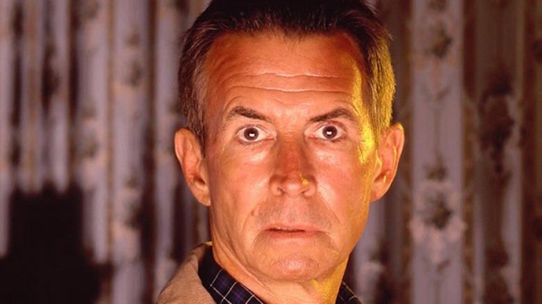 Anthony Perkins wide-eyed