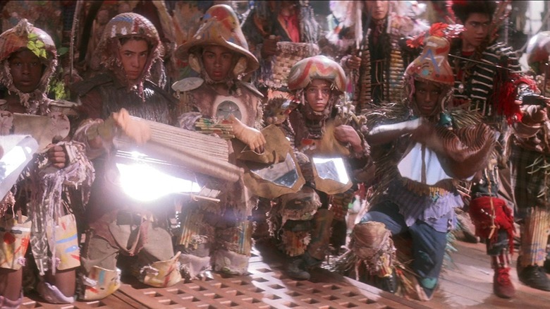 The Lost Boys in armor hold mirrors in "Hook" (1991)