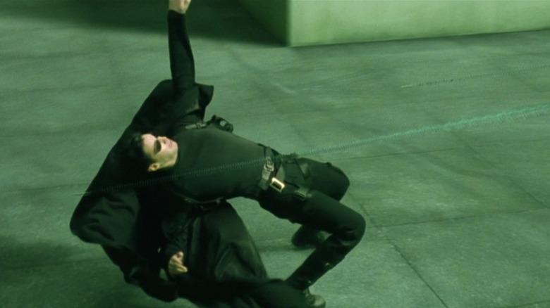 Neo dodging bullets in The Matrix (1999)