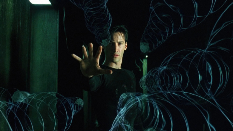 Neo holding back bullets in Matrix in 