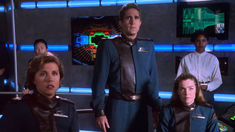 Commander Jeffrey Sinclair and others watching a screen in Babylon 5