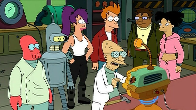 The Planet Express crew gathered around the What-If Machine