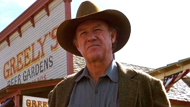 Sheriff 'Little Bill' Daggett wearing his hat while standing outside in "Unforgiven"