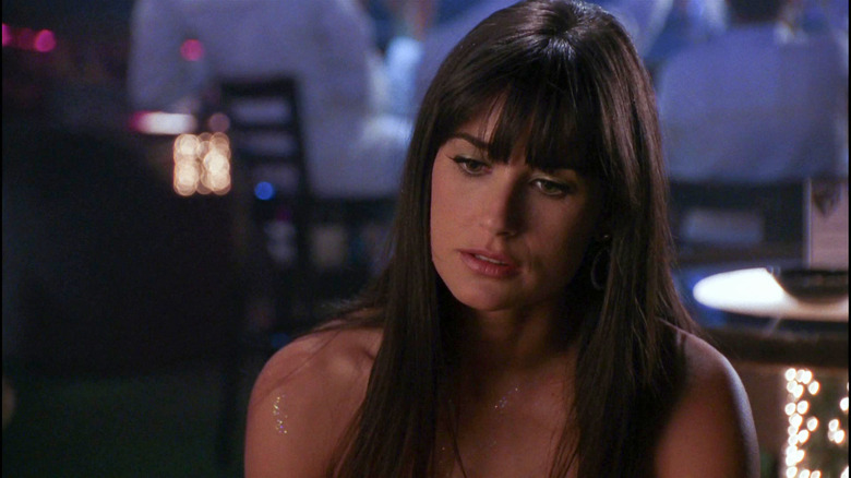 Erin Grant looking bored in club in Striptease (1996)