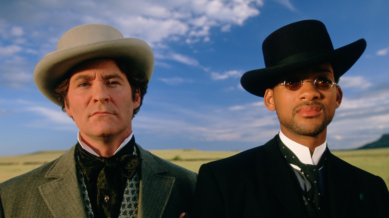 Artemus Gordon and James West in finery standing outside in Wild Wild West (1999)