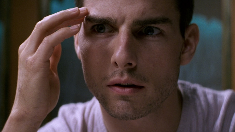 Ethan Hunt hand on head