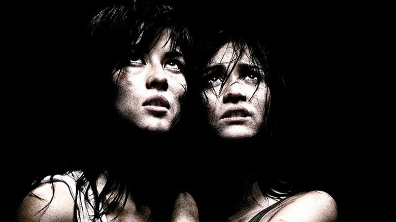 Two women in the dark