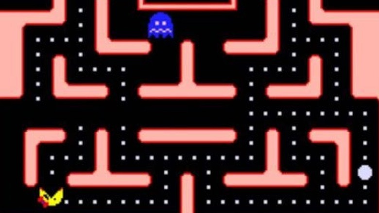 Ms. Pac-Man eating ghosts