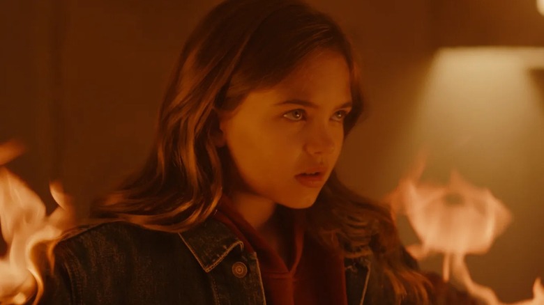 Charlie surrounded by fire in Firestarter (2022)