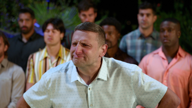 Ronnie squinting in front of the other contestants on I Think You Should Leave with Tim Robinson
