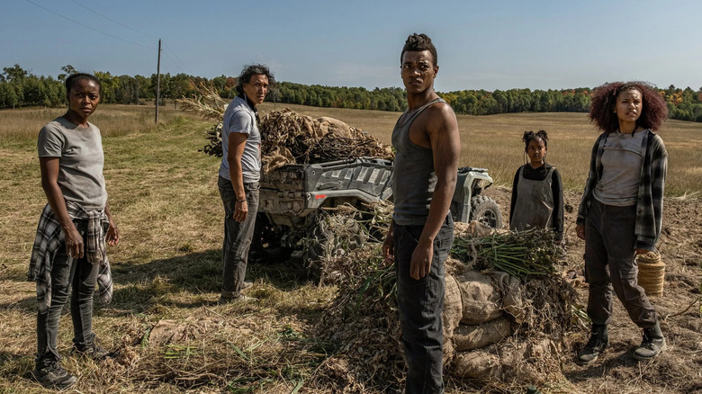 Hailey, Galen, Manny, Haile Amare, Cookie, and Danis standing outside in 40 ACRES