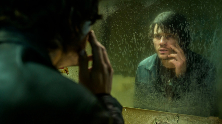 James Sunderland stares in the mirror in 