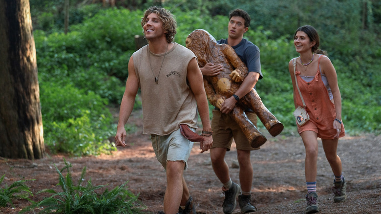 Buck leading Alex and Poppy to a party in People We Meet on Vacation