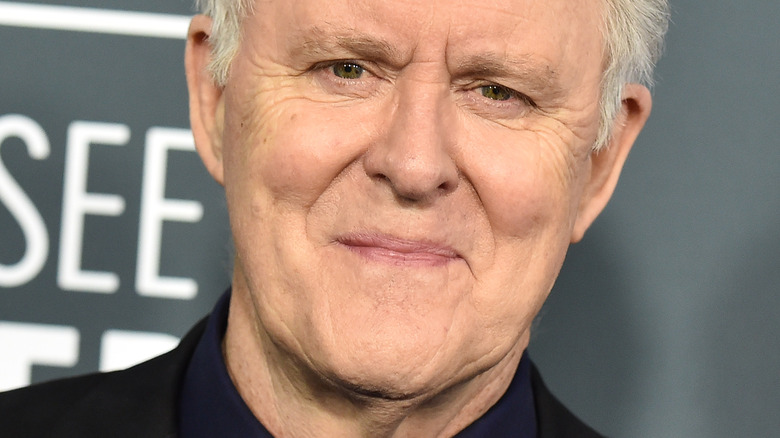 John Lithgow smiling for the camera