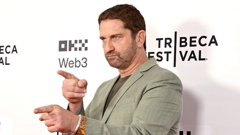 Gerard Butler pointing on Tribeca Film Festival red carpet