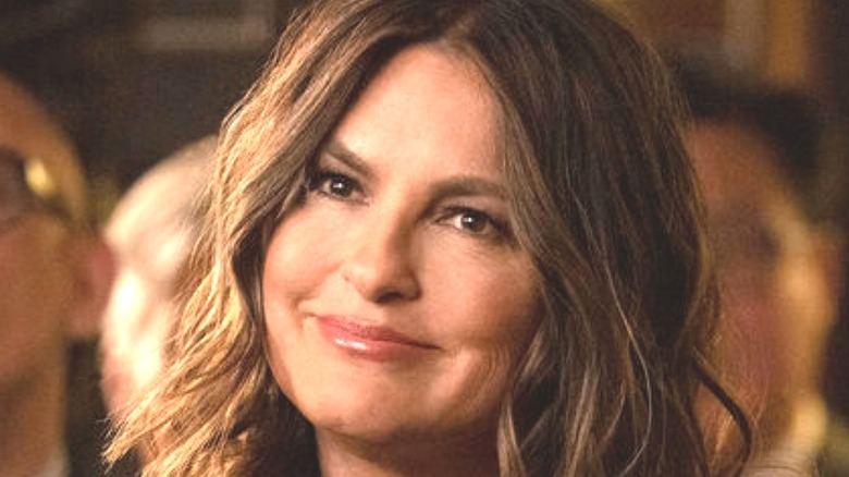 Olivia Benson smiling and head tilted