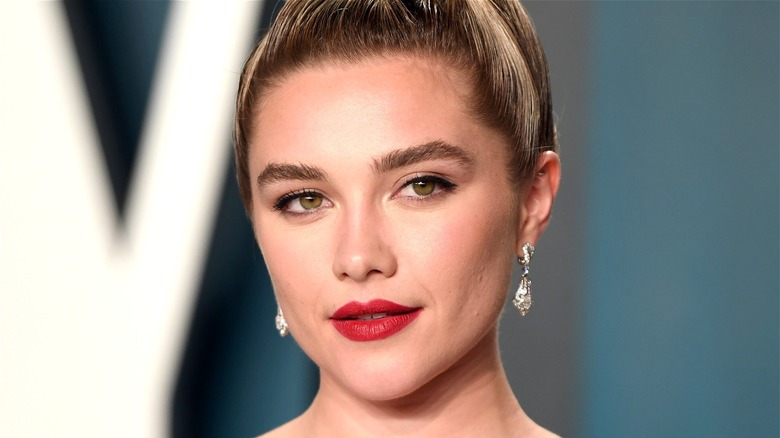 Florence Pugh posing at event