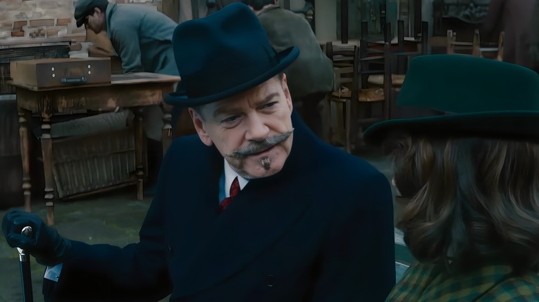 Hercule Poirot looks suspicious 