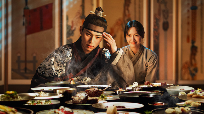King Yi Heon sits at a table with food in Bon Appetit, Your Majesty