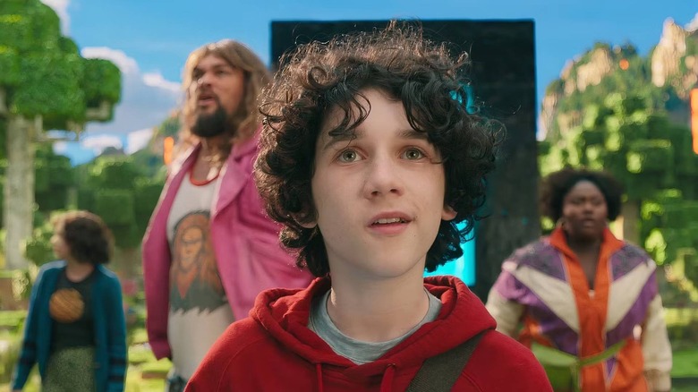 Henry with friends looking at the Overworld in A Minecraft Movie