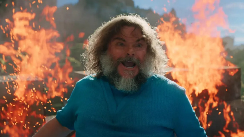 Steve screaming surrounded by fire in A Minecraft Movie