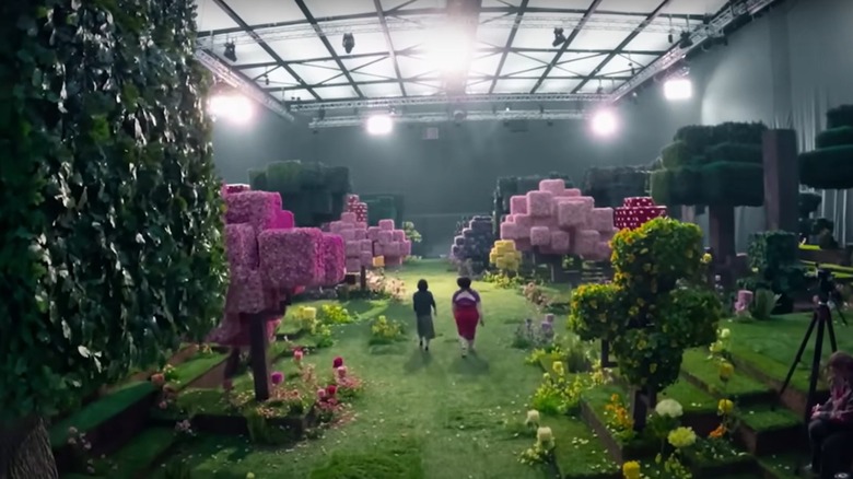 Left image: two actors on a soundstage; right image: Jack Black on the set of A Minecraft Movie