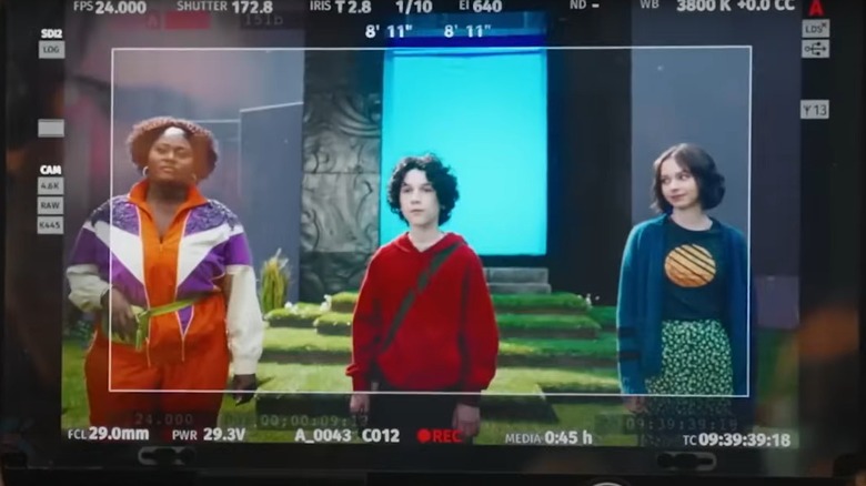 Three actors in-camera in front of a portal in A Minecraft Movie