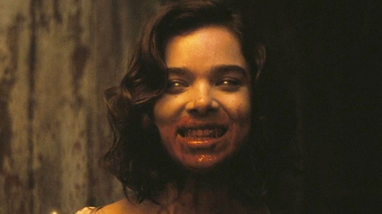 Mary with blood on her mouth and teeth after she becomes a vampire in Sinners