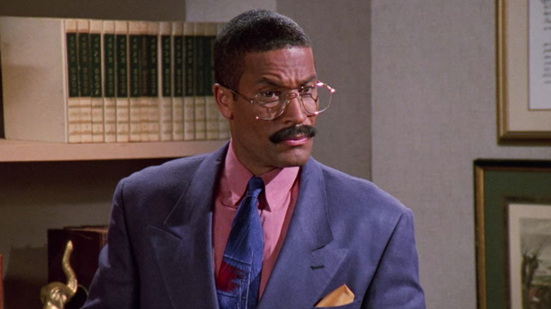 Jackie Chiles raising one eyebrow