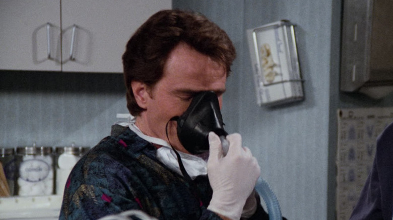 Tim Whatley inhaling nitrous oxide