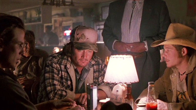 David, Mike, and Bobby sitting at a bar in in Fire in the Sky