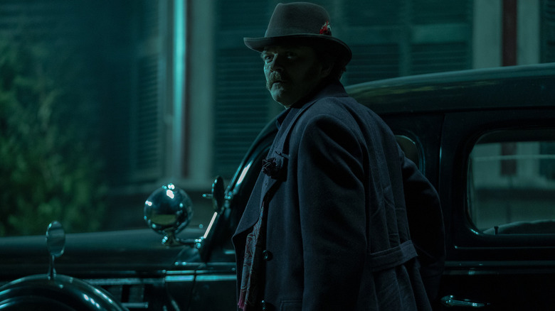 Richard Straker standing near a car in Salem's Lot