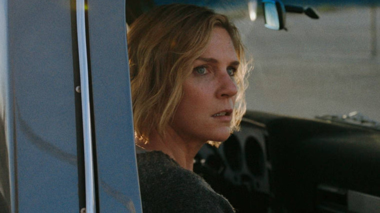 Carol inside a truck on 